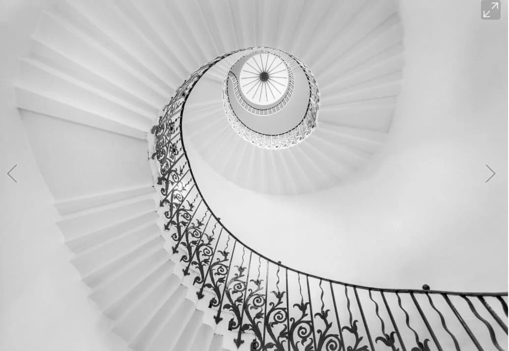 Spiral staircase symbolizing the upward arc of a leadership transition